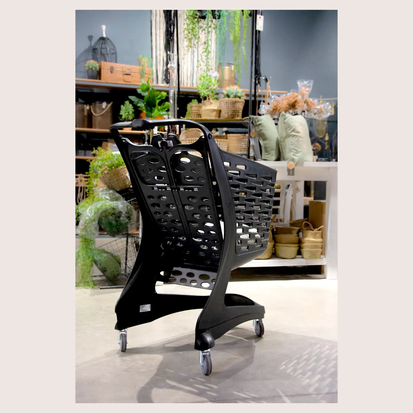 80 L plastic shopping trolley in use in-store