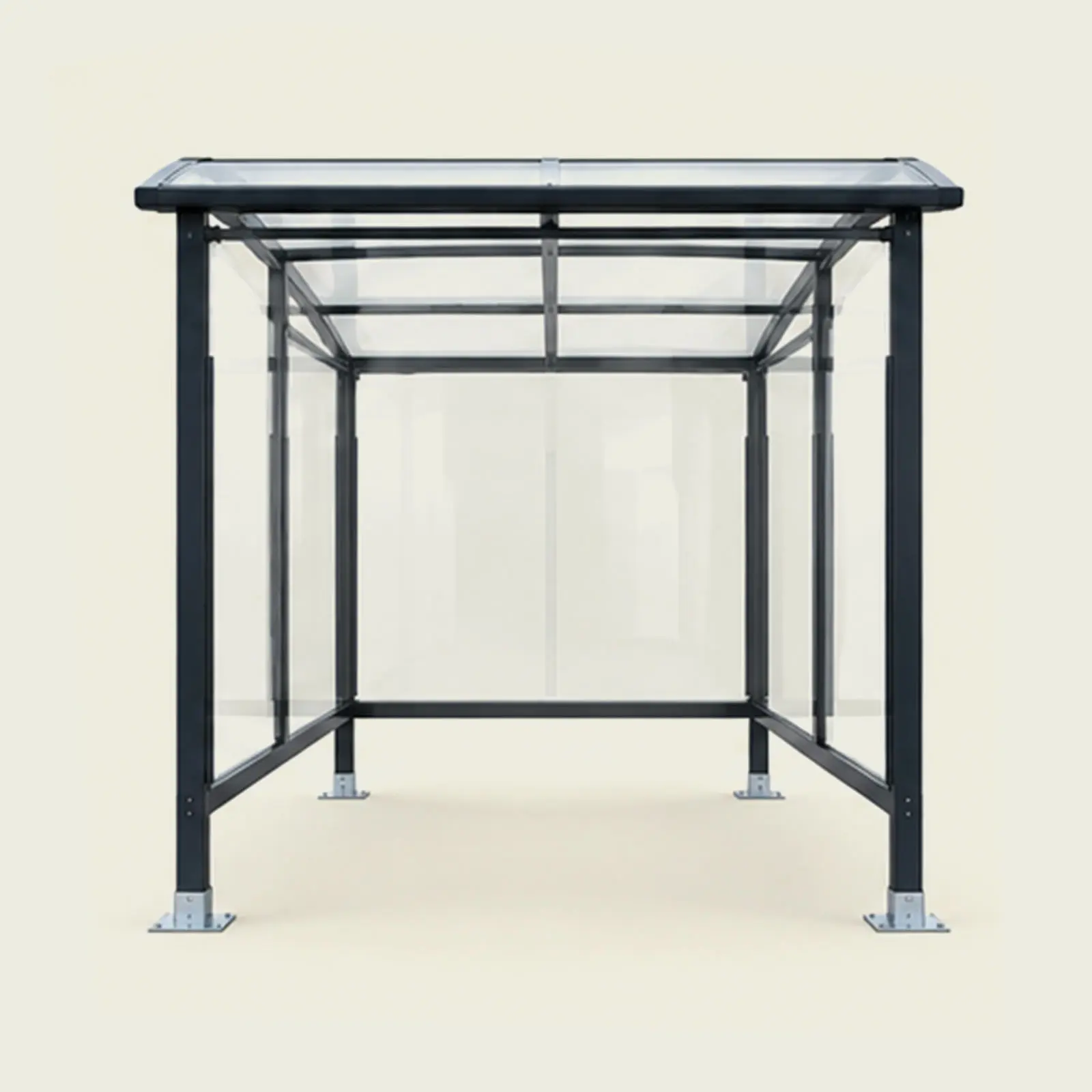 Vue de face d’un abri à chariots de supermarché avec structure métallique et vitrage transparent